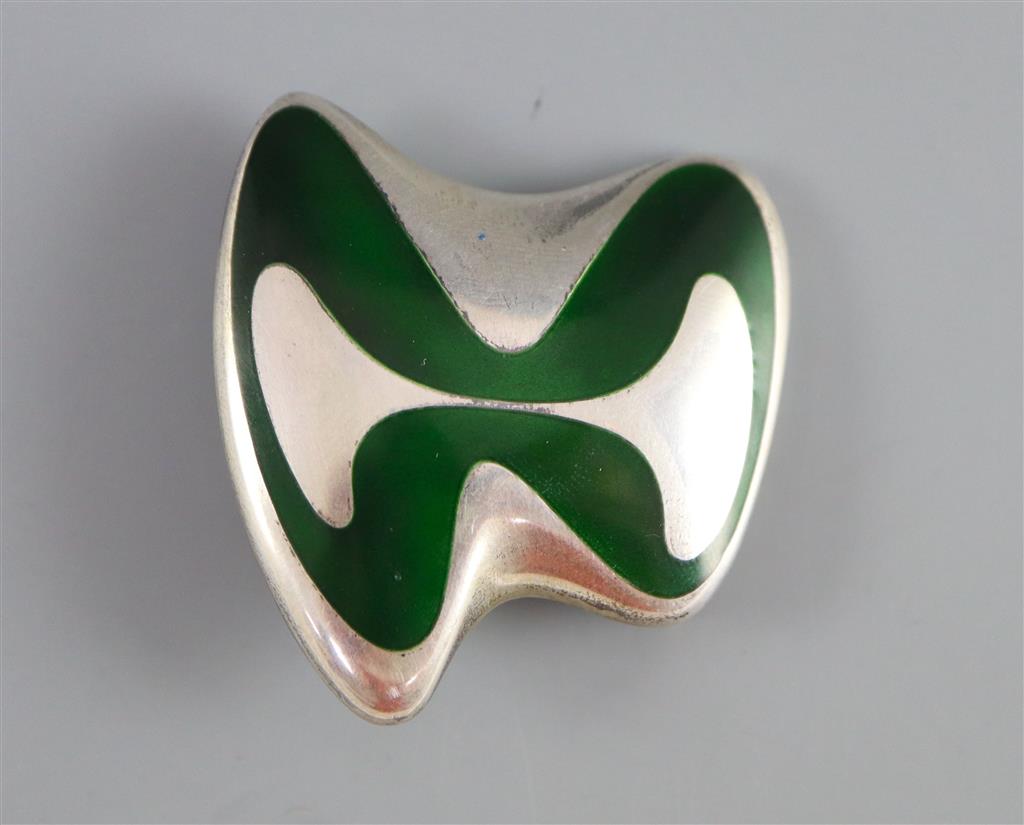 A late 1960s Danish Georg Jensen silver and green enamel abstract brooch, designed by Henning Koppel, design no. 315,